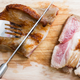 Illustration for article titled We should be eating medium-rare pork
